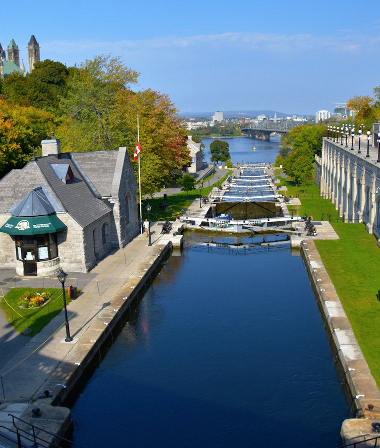 The Ottawa Locks on the Rideau Canal, with Parliament Hill above the trees